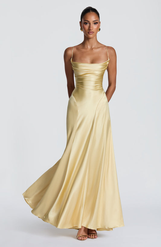 https://cdn.shopify.com/s/files/1/2060/7491/files/adelina-maxi-dress-lemon-dress-babyboo-fashion-1227051432.jpg?v=1773709597
