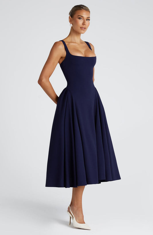 https://cdn.shopify.com/s/files/1/2060/7491/files/betty-midi-dress-navy-dress-babyboo-fashion-1114021635.jpg?v=1757594526