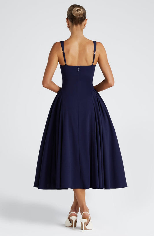 https://cdn.shopify.com/s/files/1/2060/7491/files/betty-midi-dress-navy-dress-babyboo-fashion-1114021636.jpg?v=1757594525