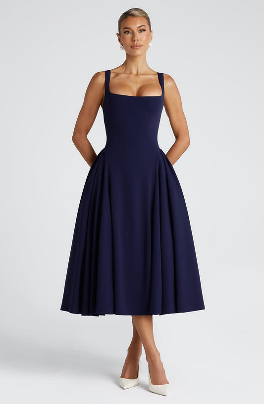 https://cdn.shopify.com/s/files/1/2060/7491/files/betty-midi-dress-navy-dress-babyboo-fashion-1114021638.jpg?v=1757594526