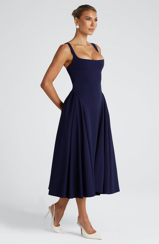 https://cdn.shopify.com/s/files/1/2060/7491/files/betty-midi-dress-navy-dress-babyboo-fashion-1114021640.jpg?v=1757594526