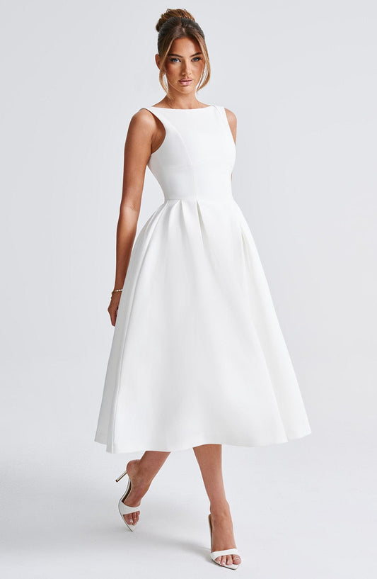 https://cdn.shopify.com/s/files/1/2060/7491/files/clarabella-midi-dress-ivory-dress-babyboo-fashion-32087088496703.jpg?v=1756370620