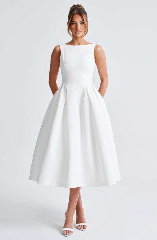 https://cdn.shopify.com/s/files/1/2060/7491/files/clarabella-midi-dress-ivory-dress-babyboo-fashion-32087088529471.jpg?v=1756370621