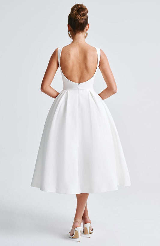 https://cdn.shopify.com/s/files/1/2060/7491/files/clarabella-midi-dress-ivory-dress-babyboo-fashion-32087088595007.jpg?v=1756370621
