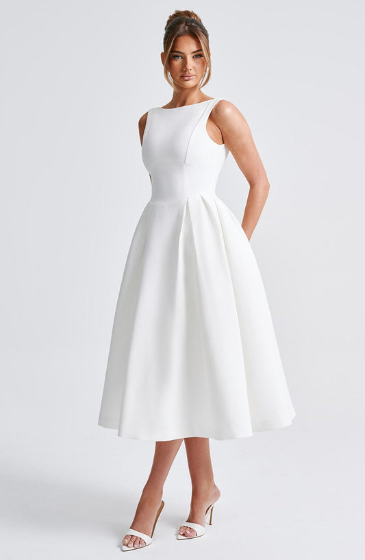 https://cdn.shopify.com/s/files/1/2060/7491/files/clarabella-midi-dress-ivory-dress-babyboo-fashion-32087088627775.jpg?v=1756370621