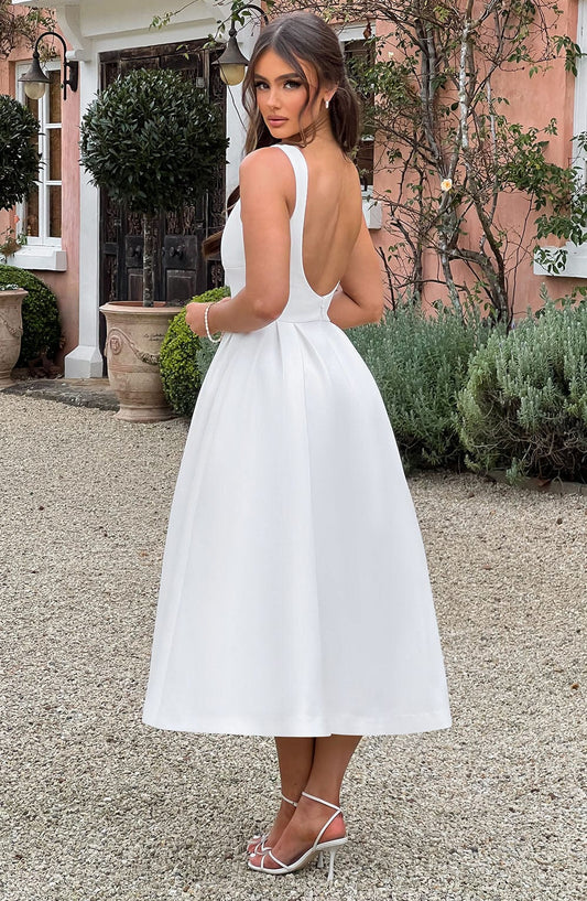 https://cdn.shopify.com/s/files/1/2060/7491/files/clarabella-midi-dress-ivory-dress-babyboo-fashion-32087909204031.jpg?v=1756370620