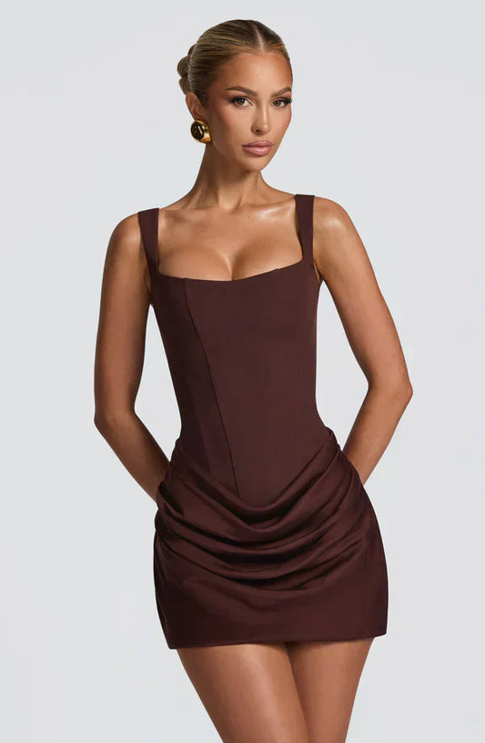 https://cdn.shopify.com/s/files/1/0810/9975/1663/files/cornelia-mini-dress-plum-brown-dress-babyboo-fashion-1182255709.webp?v=1775495665
