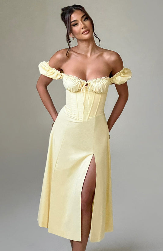 https://cdn.shopify.com/s/files/1/2060/7491/files/courtney-midi-dress-lemon-dress-babyboo-fashion-31480359911487.jpg?v=1756295358