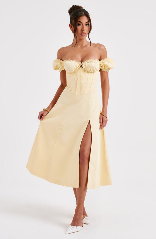 https://cdn.shopify.com/s/files/1/2060/7491/files/courtney-midi-dress-lemon-dress-babyboo-fashion-31480359944255.jpg?v=1756295359