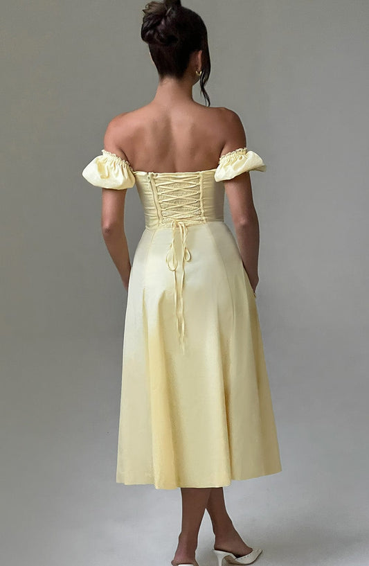 https://cdn.shopify.com/s/files/1/2060/7491/files/courtney-midi-dress-lemon-dress-babyboo-fashion-31480359977023.jpg?v=1756295358