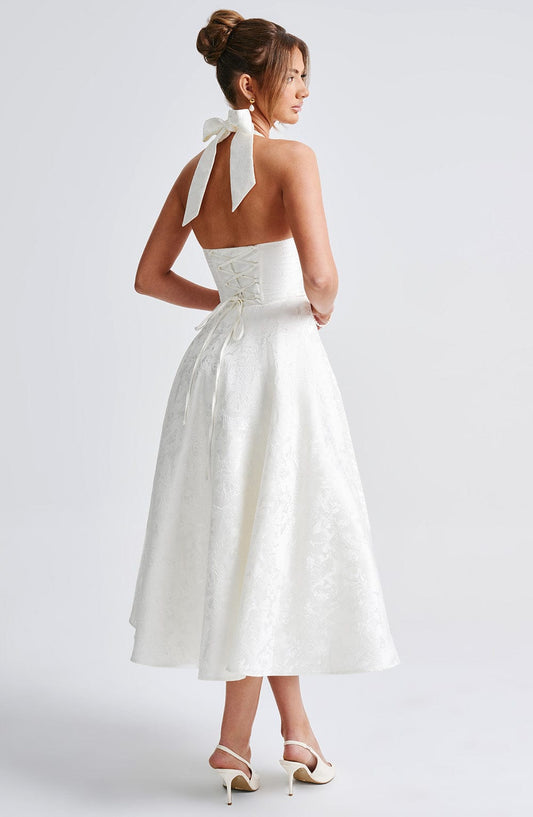 https://cdn.shopify.com/s/files/1/2060/7491/files/effie-midi-dress-ivory-dress-babyboo-fashion-32087090692159.jpg?v=1757594900