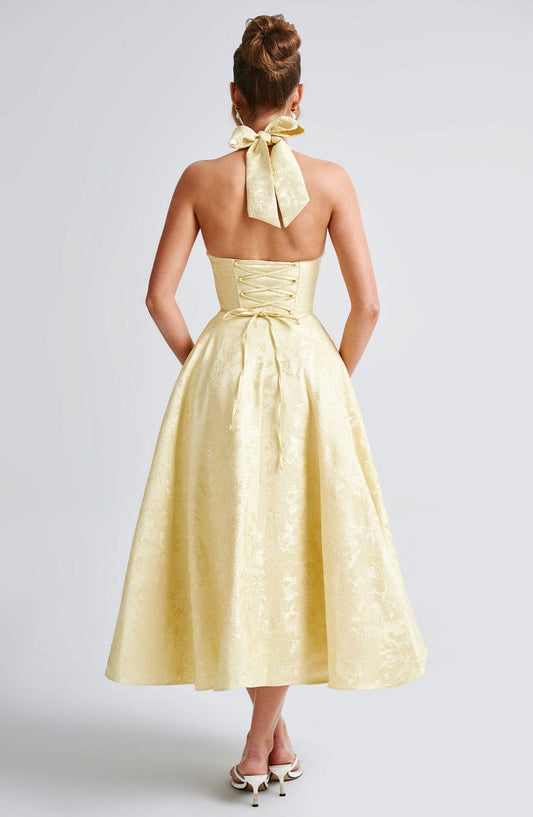 https://cdn.shopify.com/s/files/1/2060/7491/files/effie-midi-dress-lemon-dress-babyboo-fashion-32087091380287.jpg?v=1757594893