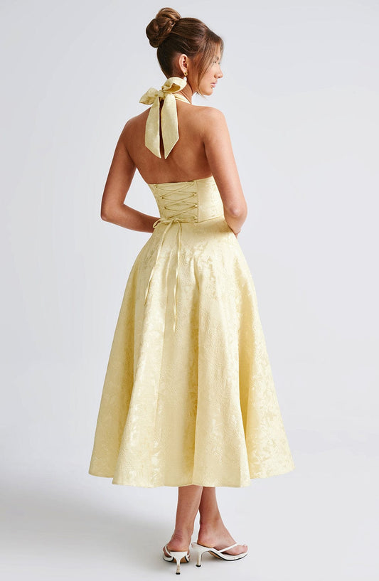 https://cdn.shopify.com/s/files/1/2060/7491/files/effie-midi-dress-lemon-dress-babyboo-fashion-32087091576895.jpg?v=1757594893