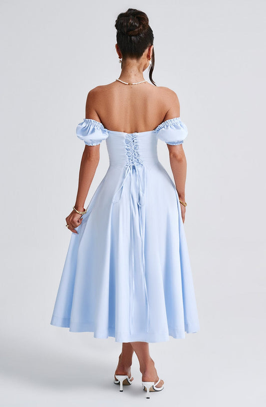 https://cdn.shopify.com/s/files/1/2060/7491/files/elora-midi-dress-blue-dress-babyboo-fashion-31724225003583.jpg?v=1756294797