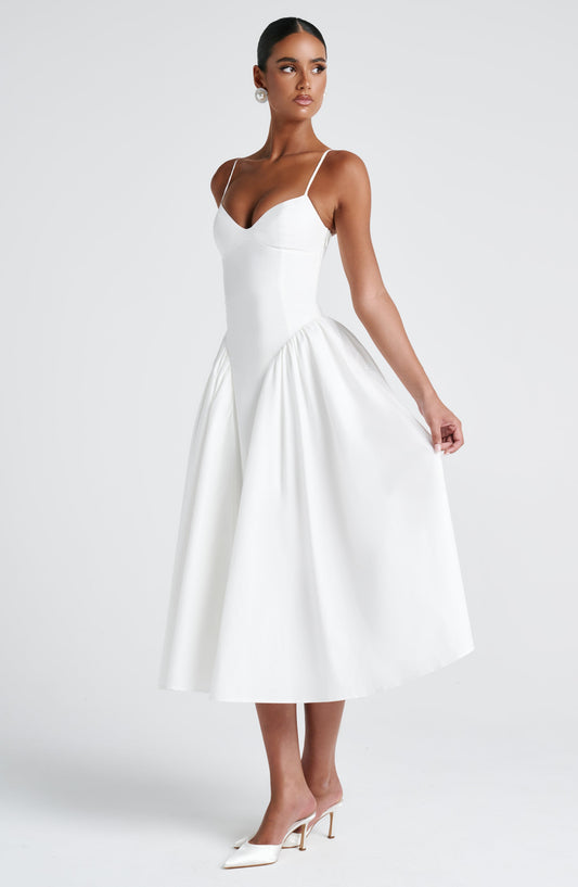 https://cdn.shopify.com/s/files/1/2060/7491/files/emerson-midi-dress-ivory-dress-babyboo-fashion-1146028846.jpg?v=1757594432