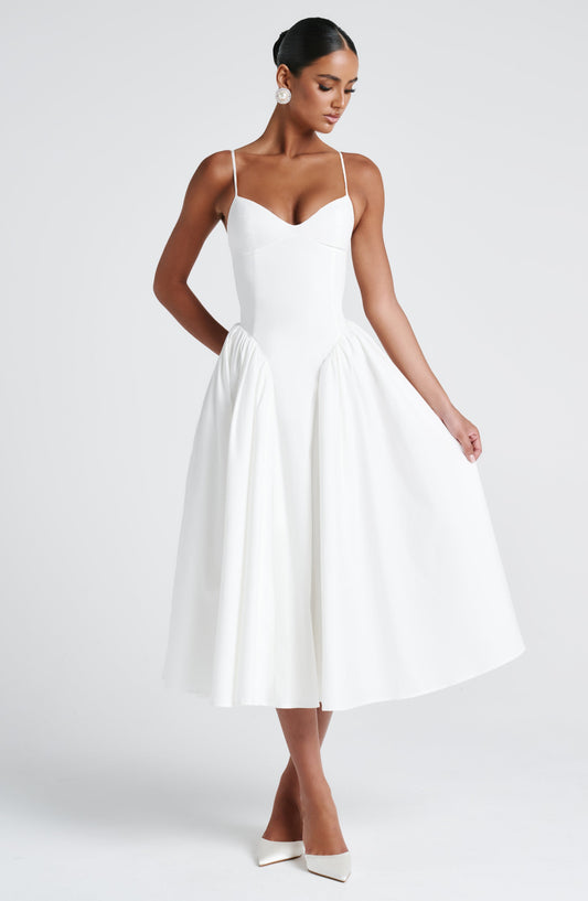 https://cdn.shopify.com/s/files/1/2060/7491/files/emerson-midi-dress-ivory-dress-babyboo-fashion-1146028848.jpg?v=1757594433