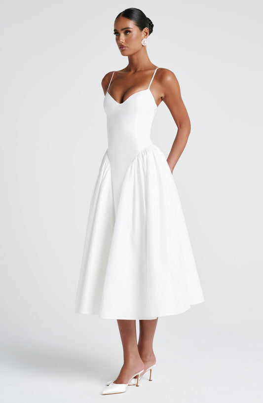 https://cdn.shopify.com/s/files/1/2060/7491/files/emerson-midi-dress-ivory-dress-babyboo-fashion-1146028850.jpg?v=1757594433