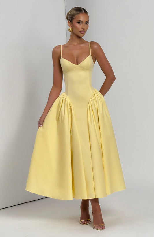 https://cdn.shopify.com/s/files/1/2060/7491/files/emerson-midi-dress-lemon-dress-babyboo-fashion-1175964139.jpg?v=1756292429