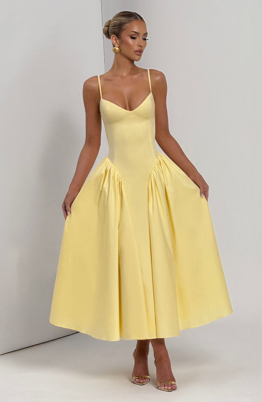 https://cdn.shopify.com/s/files/1/2060/7491/files/emerson-midi-dress-lemon-dress-babyboo-fashion-1175964140.jpg?v=1756292429
