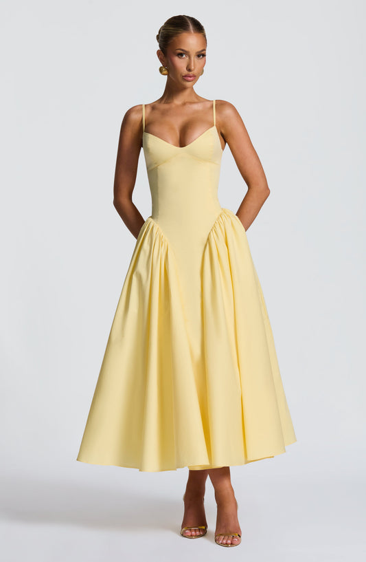 https://cdn.shopify.com/s/files/1/2060/7491/files/emerson-midi-dress-lemon-dress-babyboo-fashion-1176052411.jpg?v=1756292429