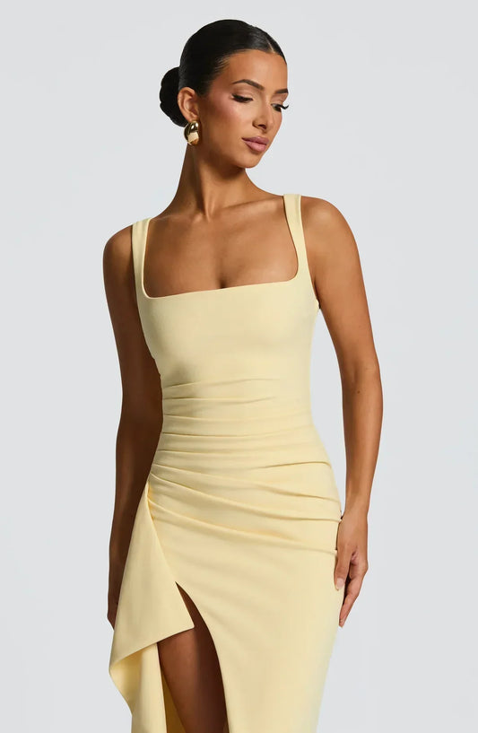 https://cdn.shopify.com/s/files/1/0810/9975/1663/files/katana-maxi-dress-lemon-dress-babyboo-fashion-1171050239_1174x1800_01b7b4b7-3703-4685-b3db-c33d3215a5a4.webp?v=1775496090