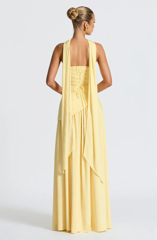 https://cdn.shopify.com/s/files/1/0810/9975/1663/files/maliyah-maxi-dress-lemon-dress-babyboo-fashion-1154263794_1174x1800_7f9f470d-53ea-456b-87de-e1e5a2856e25.webp?v=1775496049